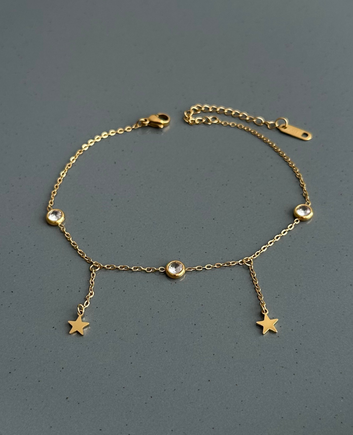 12-1-2.png çelik gold sallantılı yıldız taş halhal - Görsel 1