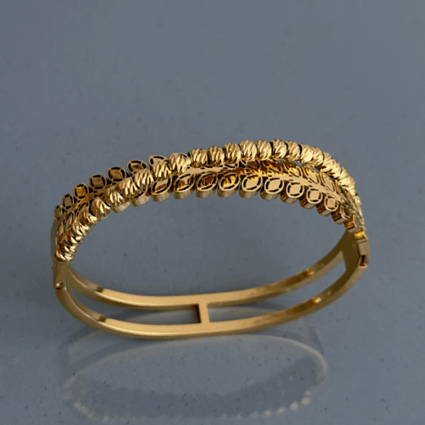 çelik gold yaprak dorika kelepçe