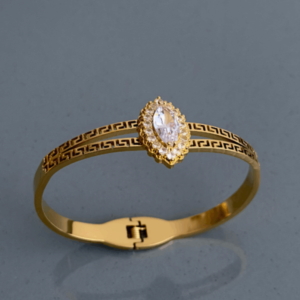 çelik gold elips taşlı kelepçe