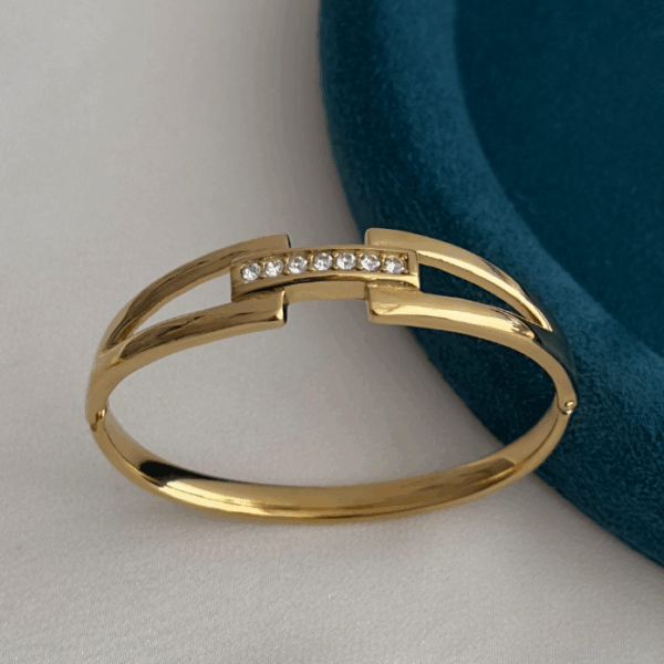 çelik gold geçme ortası taşlı kelepçe