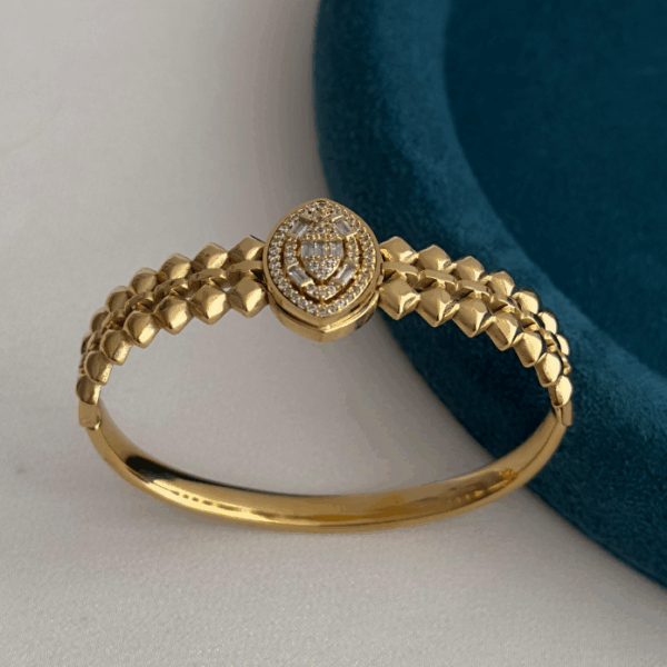 çelik gold elips taşlı kelepçe