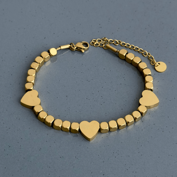 çelik gold dorika üç kalp bileklik