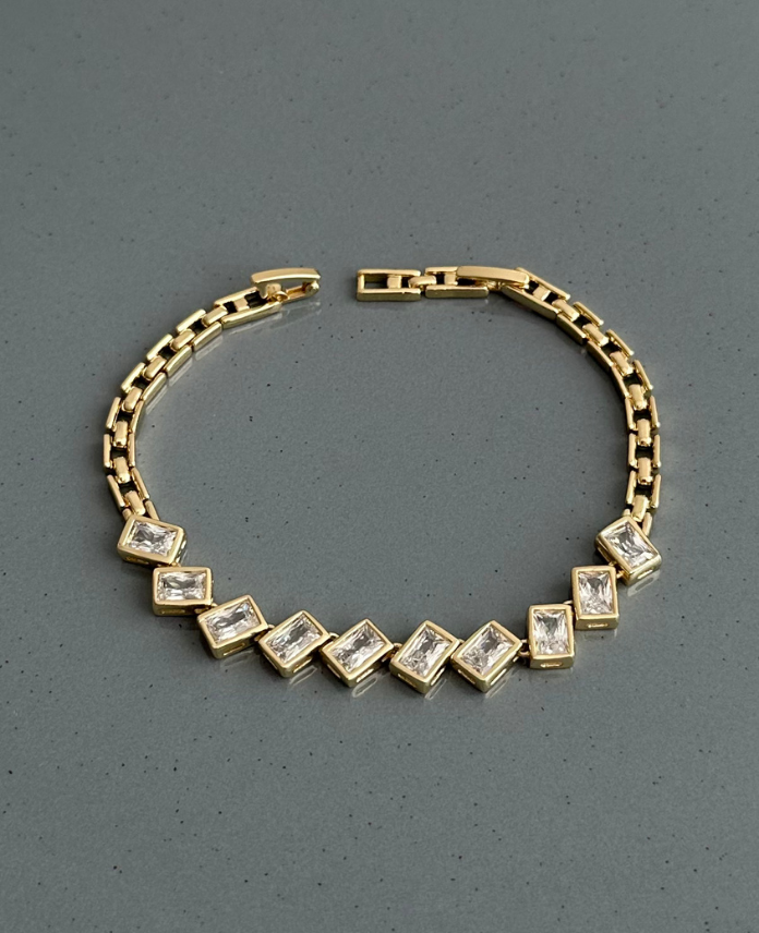 7-1-2.png xuping gold dikdörtgen çapraz taşlı bileklik - Görsel 1