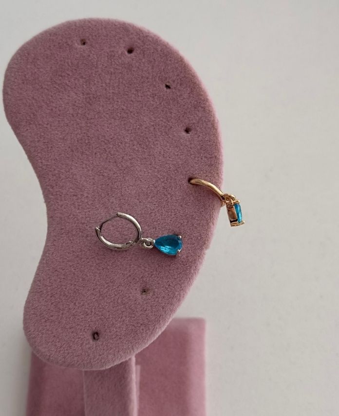 CHESALLANTILIMAVITAS-1.jpg Çelik Sallantılı Mavi Taş Helix Piercing - Görsel 1