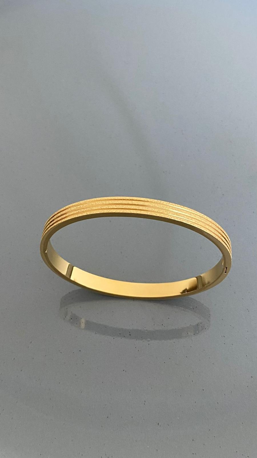 CKEINCEDORTSIRASIMLIG-1.jpeg Çelik İnce 4 Sıra Simli Kelepçe - Görsel 1