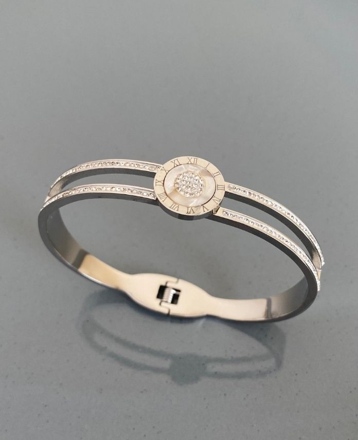 CKEORTASITEKTASLIROMENRAKAMLITASLIS.jpg Çelik Ortası Tek Taşlı Romen Rakamlı Kelepçe - Görsel 1