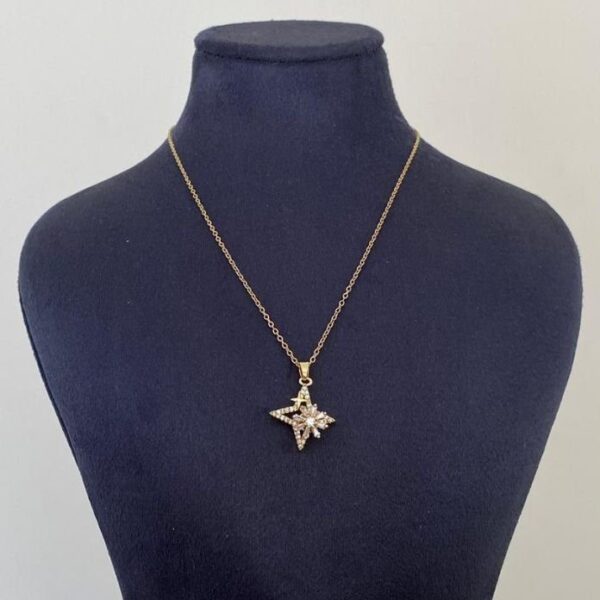 Çelik Yıldız Dönen Kolye