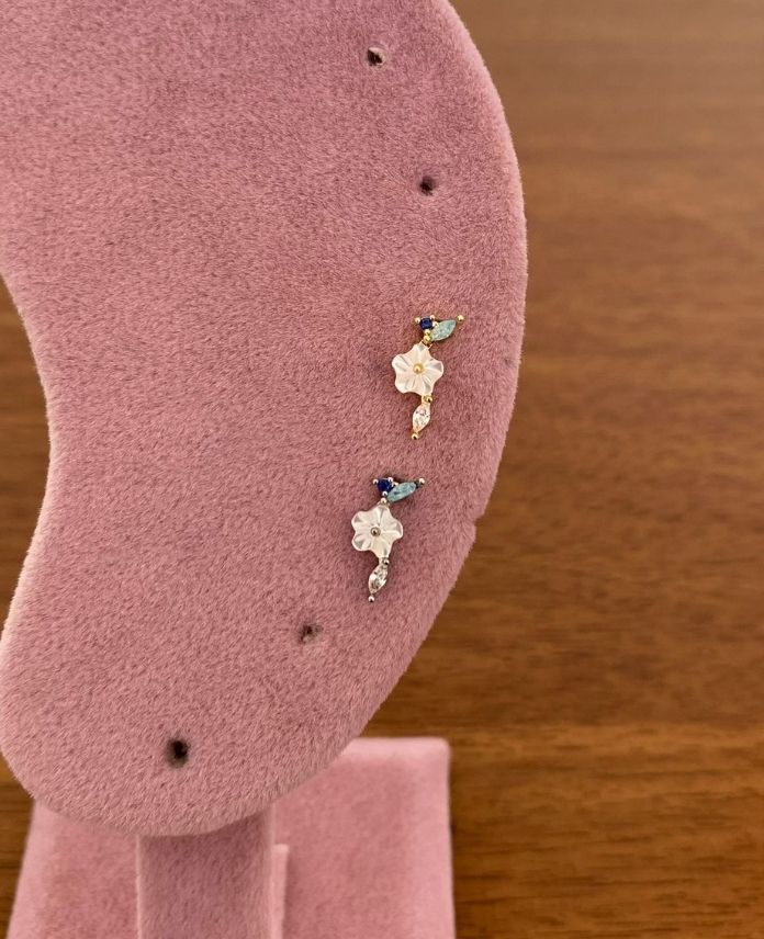 CPIBEYAZCICEK-1-1.jpg Çelik Tragus Beyaz Çiçek Piercing - Görsel 1